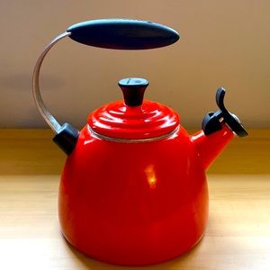 Le Creuset orange kettle teapot stovetop